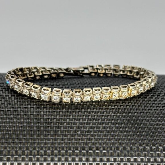 Avon Jewelry - Vintage Avon Rhinestone and Silver Tone Tennis Bracelet, Signed "Avon" and "SO""